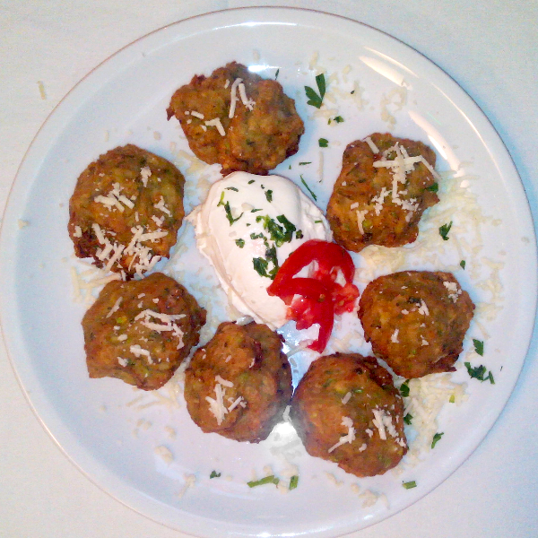 Zucchini patties with white dip